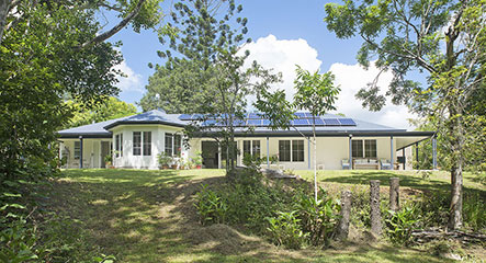 Paal kit home design adapted to rainforest setting in Kin Kin QLD