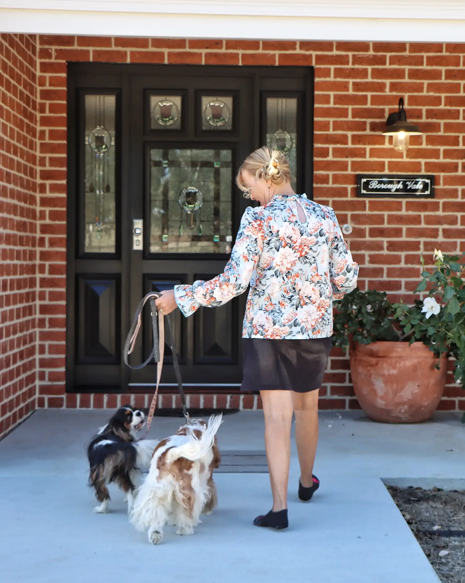 Debbie Anne in front of her new kit home