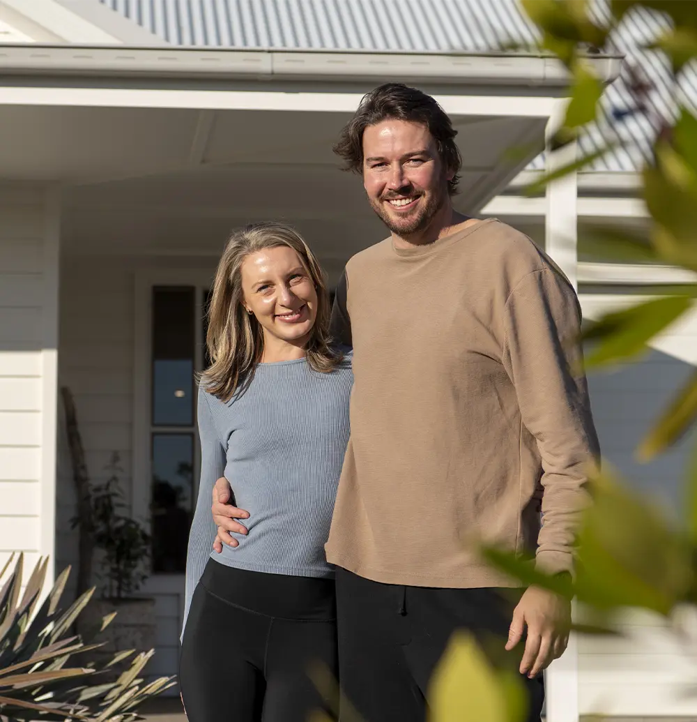 Earl and Indi Shaw in front of their Blue Mountains home