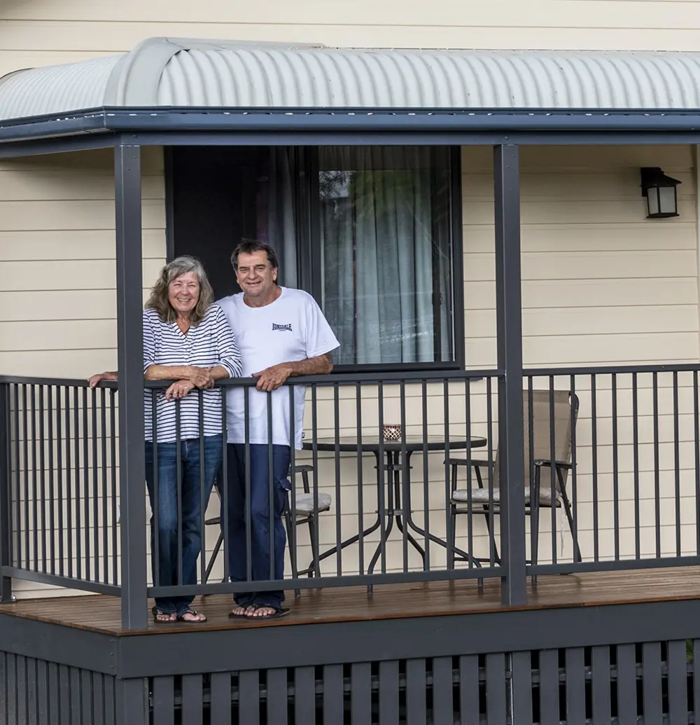 Maureen and Mark Gastaldin in front of their  kit home