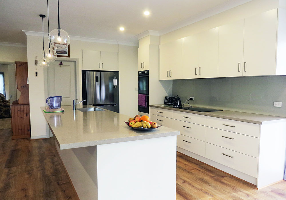 White with ashen benchtop contemporary kitchen.